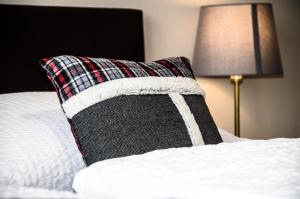 Letto o letti in una camera di Cafe-Restaurant LEO
