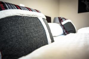 Letto o letti in una camera di Cafe-Restaurant LEO