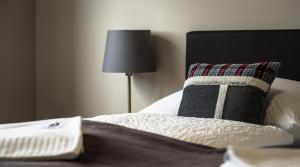 Letto o letti in una camera di Cafe-Restaurant LEO