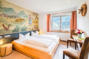 Postel nebo postele na pokoji v ubytování Zur Schönen Aussicht Hotel garni