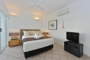 Letto o letti in una camera di Seascape Holidays at Beaches Port Douglas