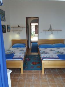 Postel nebo postele na pokoji v ubytování Apartment "I Love Njivice"