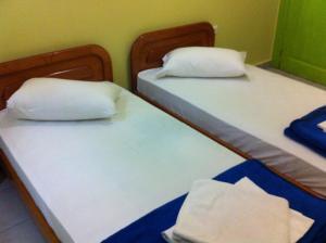 Posteľ alebo postele v izbe v ubytovaní Zeus Hostel