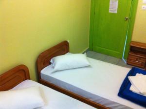 Posteľ alebo postele v izbe v ubytovaní Zeus Hostel