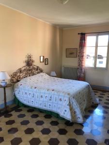 מיטה או מיטות בחדר ב-Country House La Viscarda