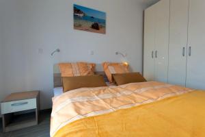 a bedroom with a large bed in a room at Villa Milohnici Florian in Milohnići +23 photos