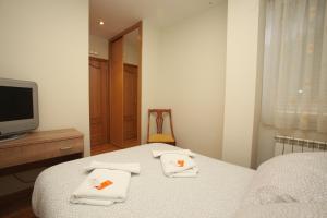 Posteľ alebo postele v izbe v ubytovaní Hostal Restaurante Central