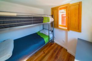Ένα ή περισσότερα κρεβάτια σε δωμάτιο στο Aguda Beach Charming House By PortoProperties4You