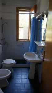 Ванна кімната в Appartamento in villa a Fontane Bianche