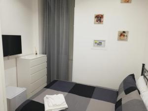 A bed or beds in a room at ImeraRooms
