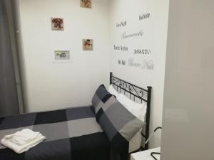 A bed or beds in a room at ImeraRooms