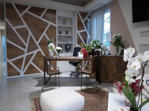 Televiisor ja/või meelelahutuskeskus majutusasutuses Hotel Buena Onda