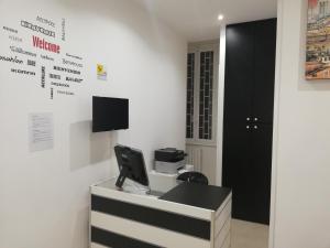 A television and/or entertainment centre at ImeraRooms