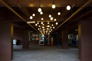 a very large room with a lot of lights in it at Casa Narinya @ Suvarnabhumi Airport in Lat Krabang