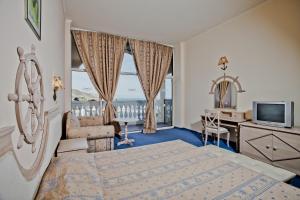 Giường trong phòng chung tại Royal Park Hotel - All Inclusive