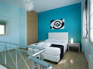 Postel nebo postele na pokoji v ubytování Aeolis Apartments & Studios