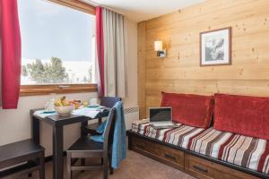 Ein Sitzbereich in der Unterkunft Résidence Pierre & Vacances Le Quartz