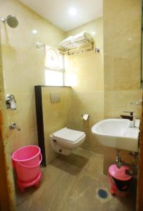 a bathroom with a toilet and a sink at Hotel City Palace in Jodhpur +24 photos