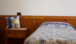 Säng eller sängar i ett rum på Country House Ramandolo Club