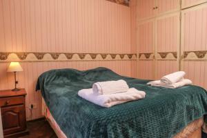 En eller flere senge i et værelse på Rosario microcentro 3 dormitorios. Downtown 3 bedroom