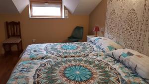 Ein Bett oder Betten in einem Zimmer der Unterkunft Los Acebos Cangas
