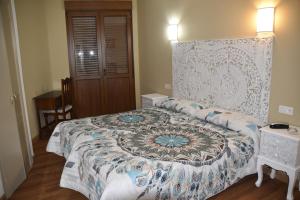 Ein Bett oder Betten in einem Zimmer der Unterkunft Los Acebos Cangas