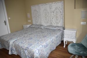Ein Bett oder Betten in einem Zimmer der Unterkunft Los Acebos Cangas