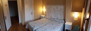 Ein Bett oder Betten in einem Zimmer der Unterkunft Los Acebos Cangas