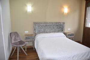 Ein Bett oder Betten in einem Zimmer der Unterkunft Los Acebos Cangas