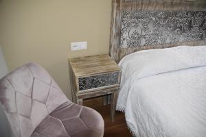 Ein Bett oder Betten in einem Zimmer der Unterkunft Los Acebos Cangas