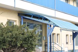 a view of the front of a hospital building at Hostel Turist in Zvolen