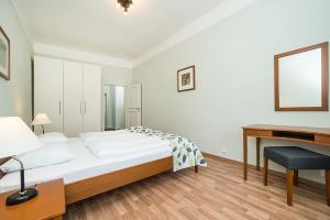 Postel nebo postele na pokoji v ubytování Hotel Orion