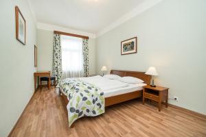 Postel nebo postele na pokoji v ubytování Hotel Orion