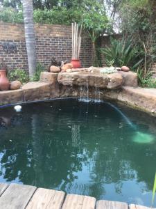 The swimming pool at or close to Sunninghill Sojourn