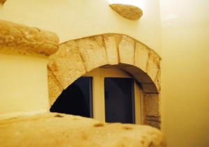 a small window in the side of a building at BeMyGuest Rutigliano in Rutigliano