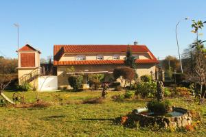 Vonkajšia záhrada v ubytovaní Casa rural agro da moa