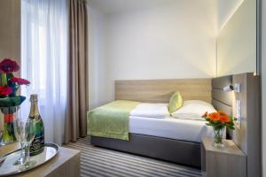 Krevet ili kreveti u jedinici u okviru objekta Hotel White Lion