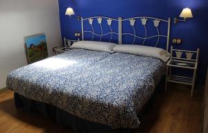 Postel nebo postele na pokoji v ubytování Casa Rural La Tia Lola