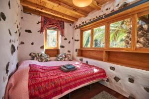 Giường trong phòng chung tại Villa Palmeras Canarias