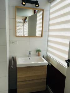 Ένα μπάνιο στο Appartement aan het strand +9 φωτογραφίες