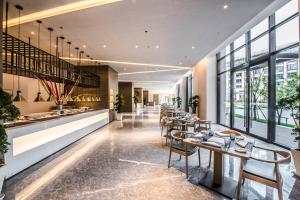 Istumisnurk majutusasutuses Q-Box Hotel Shanghai Sanjiagang -Offer Pudong International Airport and Disney shuttle