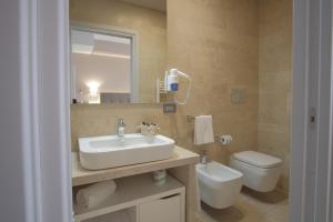 Kupatilo u objektu Netum Hotel