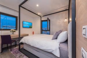 Posteľ alebo postele v izbe v ubytovaní Luxury Apartment Kortina