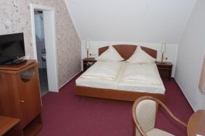 Кровать или кровати в номере Hotel Eichenhof