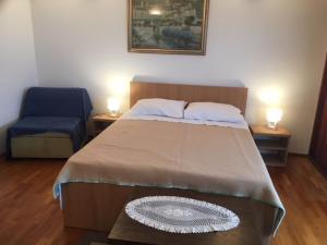 Postel nebo postele na pokoji v ubytování Holiday Home Luma