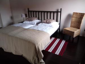 Łóżko lub łóżka w pokoju w obiekcie Apartamenty Za Murem