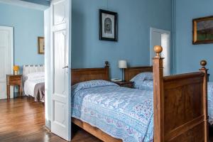 Posteľ alebo postele v izbe v ubytovaní Agriturismo Villa Gropella
