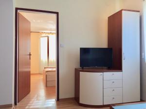 TV a/nebo společenská místnost v ubytování Guest House Sandra