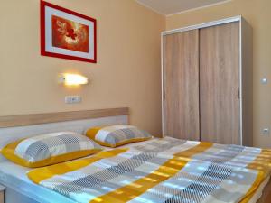 Postel nebo postele na pokoji v ubytování Guest House Sandra
