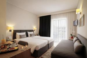Postel nebo postele na pokoji v ubytování Green Hill Hotel + 37 fotografií